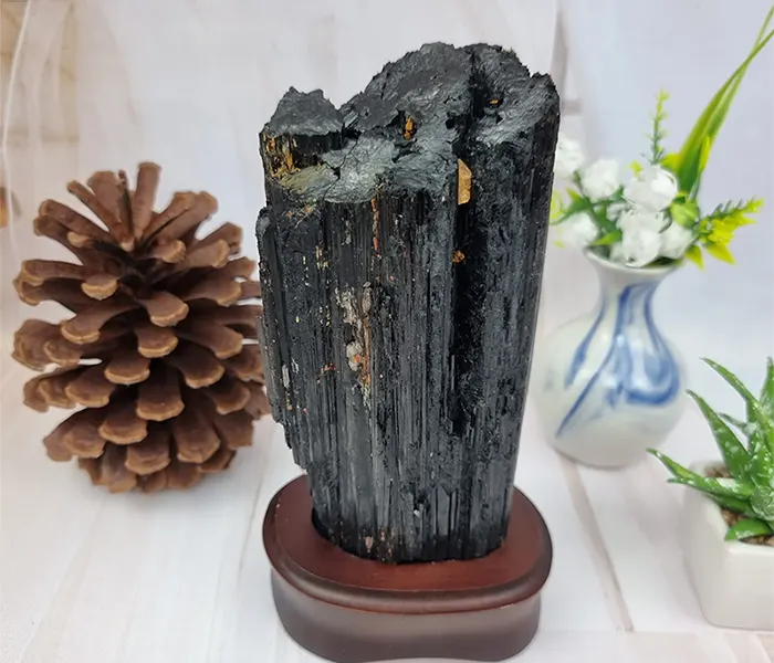 black tourmaline lucky stone with wooden base